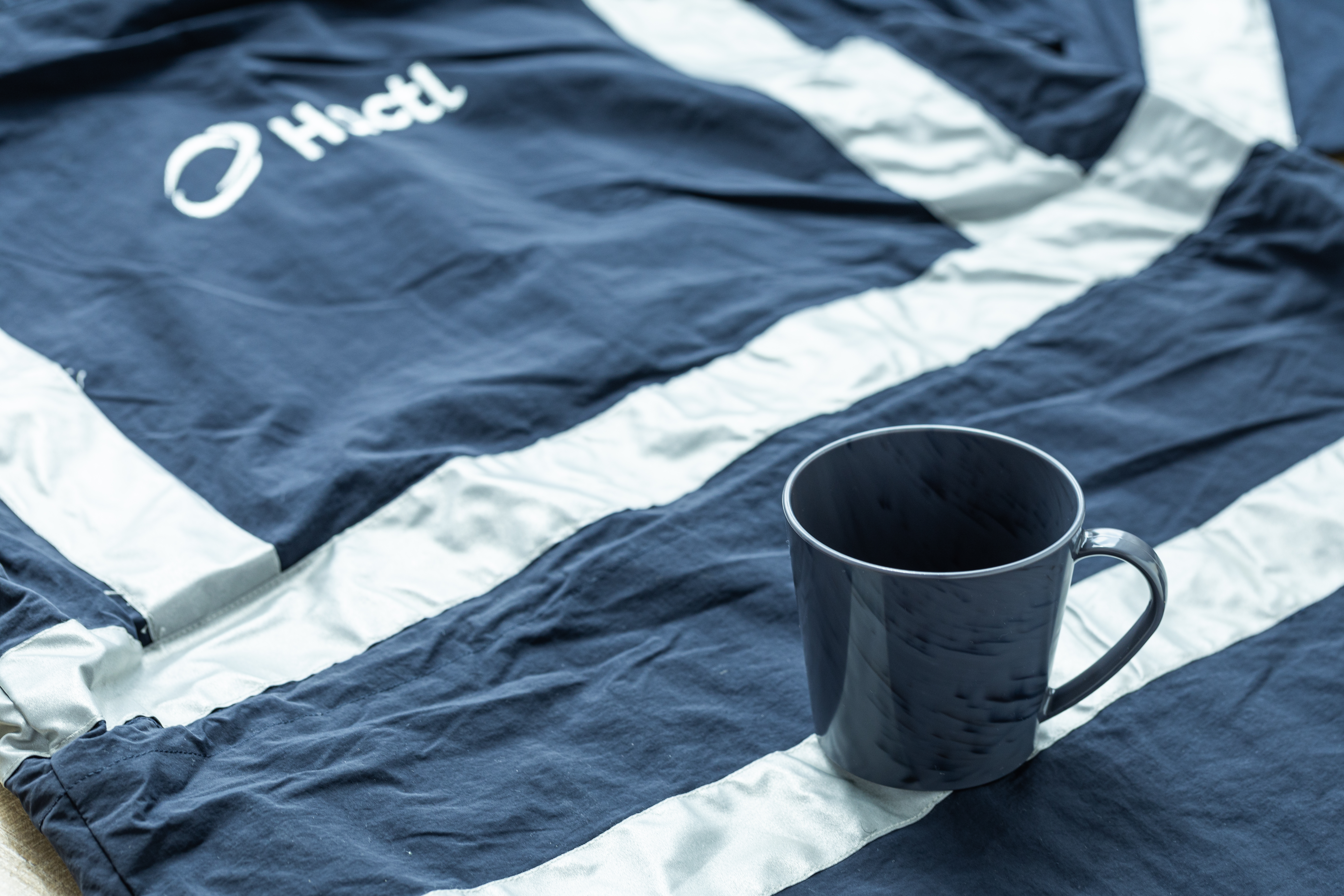 Hactl Turns Old Uniforms Into Upcycled Cups 01