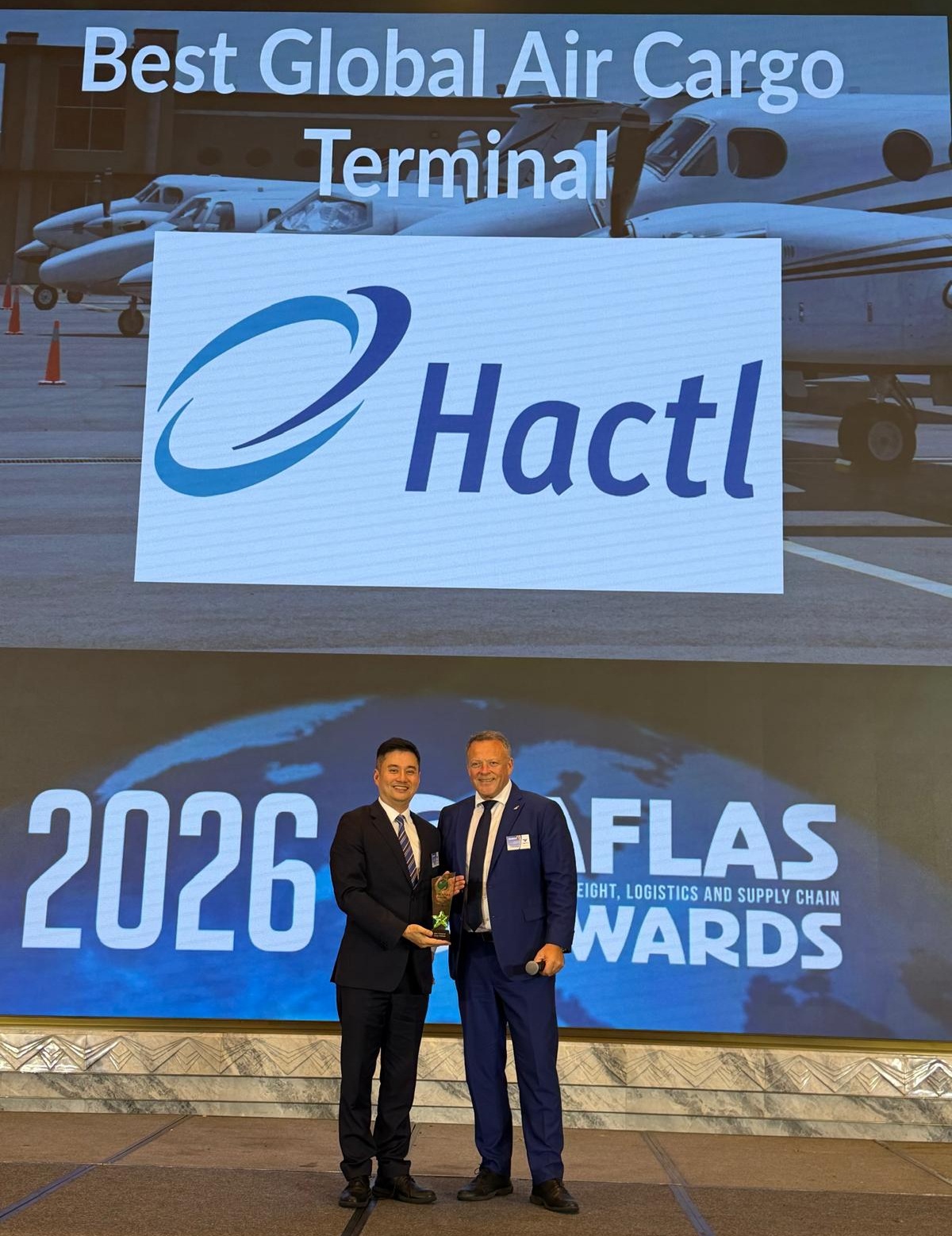 Hactl Chief Executive Frosti Lau (Left) Receives The “Best Global Air Cargo Terminal” Award At This Year’S Asian Freight, Logistics And Supply Chain (AFLAS) Awards.
