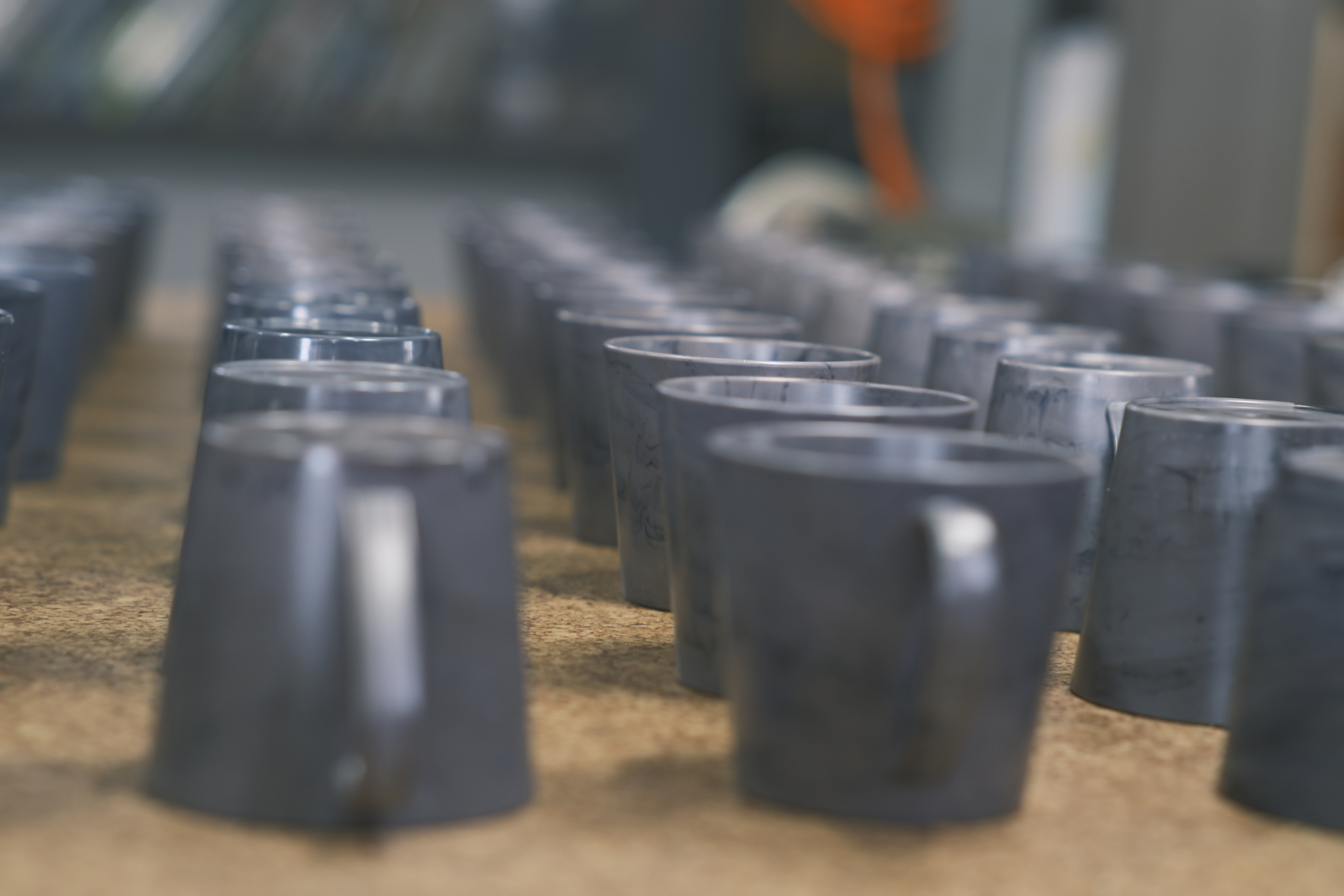 Hactl Turns Old Uniforms Into Upcycled Cups 03