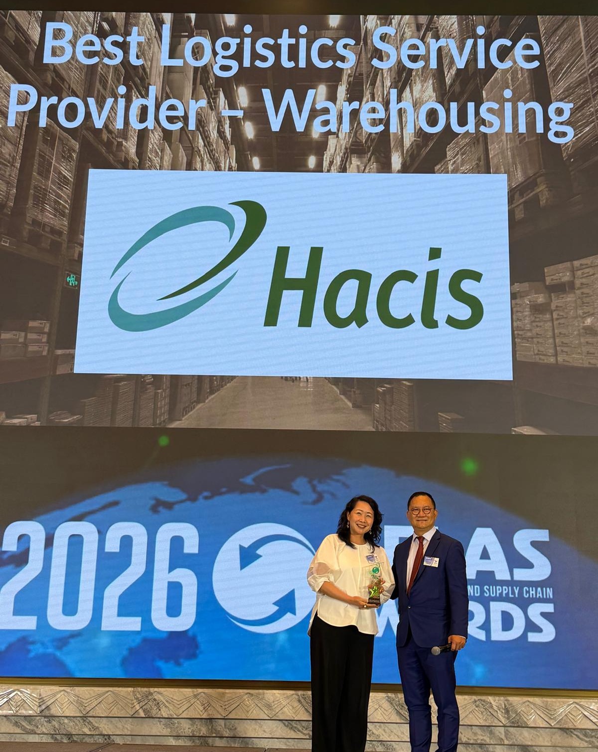 Hactl’S Executive Director – Commercial And Business Development, Joanna Li (Left), Receives The “Best Logistics Service Provider – Warehousing” Award On Behalf Of Hacis At This Year’S Asian Freight, Logistics And
